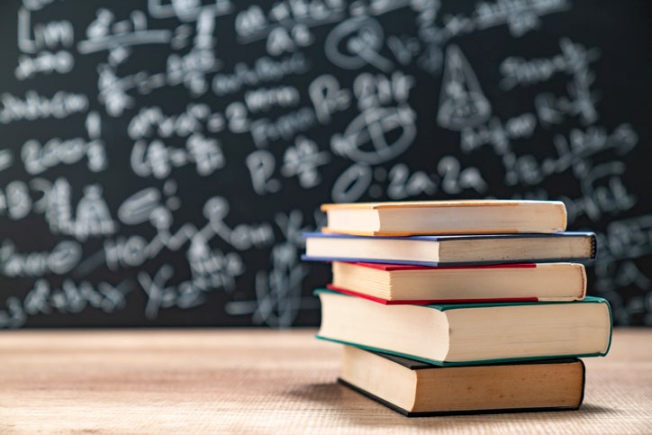 books and chalkboard